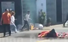 Người đàn ông mang can xăng 5 lít đốt vợ cũ