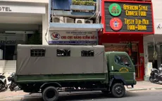Công an đang khám xét Chi cục Đăng kiểm số 6 tại TP Hồ Chí Minh