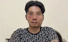 Cầm dao xông vào quán ốc cướp tiền, đâm thương tích công an