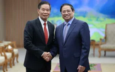Thủ tướng Phạm Minh Chính tiếp Chủ tịch Ủy ban Trung ương Mặt trận Lào xây dựng đất nước
