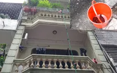 Cháy nhà, bà đặt cháu vào xô rồi thả dây từ tầng 3 để thoát hiểm