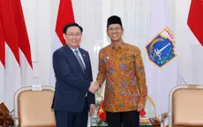Chủ tịch Quốc hội Vương Đình Huệ tiếp Thống đốc Đặc khu Thủ đô Jakarta