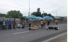 Trên đường đến trường, 2 cha con tử vong sau va chạm với container