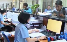 Hà Nội yêu cầu tất cả bộ phận một cửa thu phí không dùng tiền mặt từ 1/6