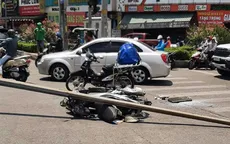 TP Hồ Chí Minh: Trụ đèn chiếu sáng ngã đè người phụ nữ bị thương