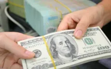 Tỷ giá dịu lại sau khi Fed hạ thêm lãi suất