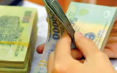 Người nợ thuế bị khấu trừ tiền lương như thế nào?