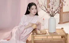 Á hậu Hoàn cầu Quốc tế Đỗ Hà Trang dịu dàng trong bộ ảnh Tết 2025