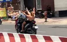 Công an vào cuộc xác minh cô gái chạy xe máy buông hai tay, đưa chân lên trời