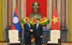 Chủ tịch nước Lương Cường tiếp Thủ tướng Lào Sonexay Siphandone