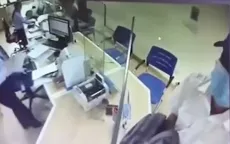 Điều tra, truy tìm đối tượng bịt mặt, cầm dao cướp ngân hàng ở Hà Nội