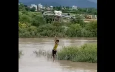 Người nông dân dùng flycam cứu 2 trẻ nhỏ giữa lũ