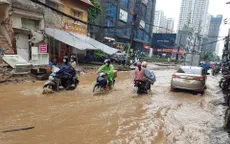 Mưa lớn chiều 14/7, nhiều tuyến phố Hà Nội bị ngập úng
