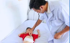 Lấy búi tóc nặng nửa cân trong bụng bé trai 5 tuổi