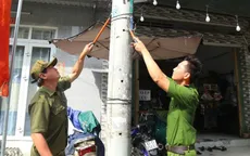 TP Hồ Chí Minh đồng loạt ra quân bóc dỡ quảng cáo sai quy định