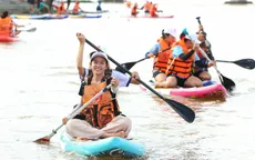 Năng lượng mới từ những mái chèo SUP trên sông Hậu