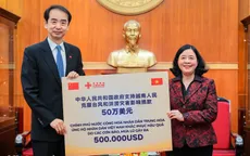 Tiếp nhận 500.000 USD hỗ trợ khắc phục hậu quả mưa lũ từ Chính phủ Trung Quốc