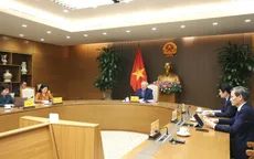 Phó Thủ tướng Thường trực Nguyễn Hòa Bình điện đàm với nguyên Phó Thủ tướng Singapore Vương Thụy Kiệt