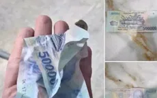 Cảnh báo thủ đoạn kẹp tiền giả vào tiền thật khi mua hàng