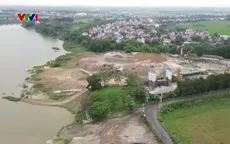 Bến bãi, cảng vật liệu xây dựng trái phép gây ô nhiễm tại xã Trung Giã (Hà Nội)