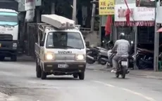 Chở cọc bê tông không chằng buộc trên nóc thùng xe, tài xế bị trừ điểm GPLX