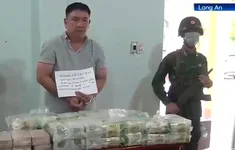 Bắt 26kg ma túy ngụy trang túi đựng trà và 12 bánh heroin