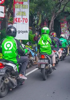 Softbank thúc đẩy đàm phán sáp nhập Grab với Gojek