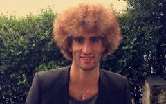 Fellaini gây sốc khi nhuộm vàng mái tóc xù để đón EURO 2016