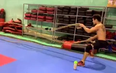 ĐT Pencak Silat Việt Nam tập thể lực với lốp xe và dây thừng