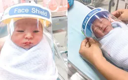 Những em bé sơ sinh được đeo mặt nạ chống COVID-19 tại Thái Lan