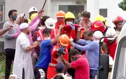 Bé trai 4 tuổi sống sót thần kỳ sau vụ sập chung cư Ấn Độ