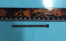 Lấy đinh sắt dài gần 8cm nằm ở vùng cổ, đâm thủng động mạch dưới đòn