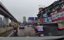 Ô tô 7 chỗ vượt ẩu tông xe máy rồi bỏ chạy