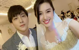 Thúy Ngân diện váy cưới hạnh phúc bên B Trần