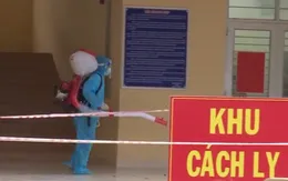 Tiêm đủ 2 mũi vaccine, đi chung thang máy với F0 có phải cách ly tập trung?