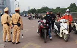 Sử dụng rượu bia, dắt xe máy qua chốt kiểm tra nồng độ cồn bị phạt không?