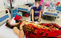 Hôn mê, suy hô hấp do bị kẹt đầu cổ trong cánh cửa thang máy vận chuyển thức ăn