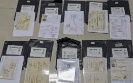 Chủ bưu cục tư nhân cầm đầu đường dây vận chuyển giấy tờ giả