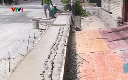 Nâng cấp đường cao hơn nền nhà dân gần nửa mét