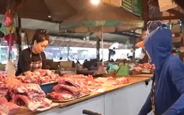 Người dân thận trọng nhưng không quay lưng với thịt lợn