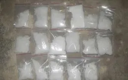 Triệt phá đường dây mua bán ma túy xuyên quốc gia, thu giữ 2 khẩu súng