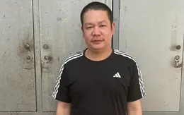 Bắt đối tượng trốn truy nã đặc biệt nguy hiểm khi đang làm thủ tục ngân hàng