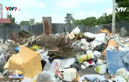 Bãi rác tự phát gây cản trở giao thông Quốc lộ 1A