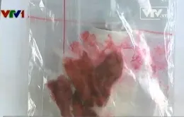 Ghê sợ thịt lợn chín chuyển màu đỏ... như máu
