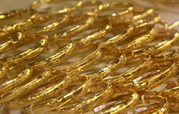 Giá vàng trong nước giảm chưa bằng 1/3 giá thế giới
