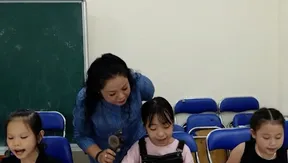 Children embrace traditional Vietnamese music