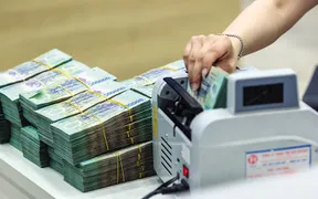 Vietnam orders banks to further cut deposit rates