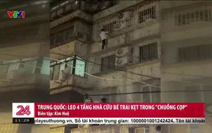Trung Quốc: Leo 4 tầng nhà cứu bé trai kẹt trong "chuồng cọp"