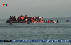 Anh hợp tác với Pháp ngăn người di cư vượt eo biển