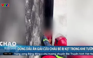 Dùng dầu ăn giải cứu cháu bé bị kẹt trong khe tường